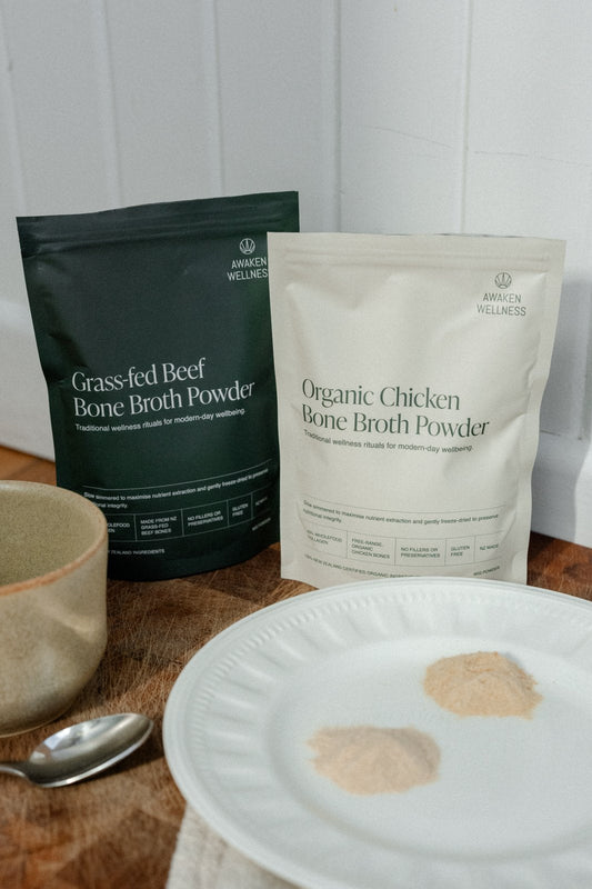 Awaken Wellness organic chicken and grass-fed beef bone broth powder shown together with the powder on a plate